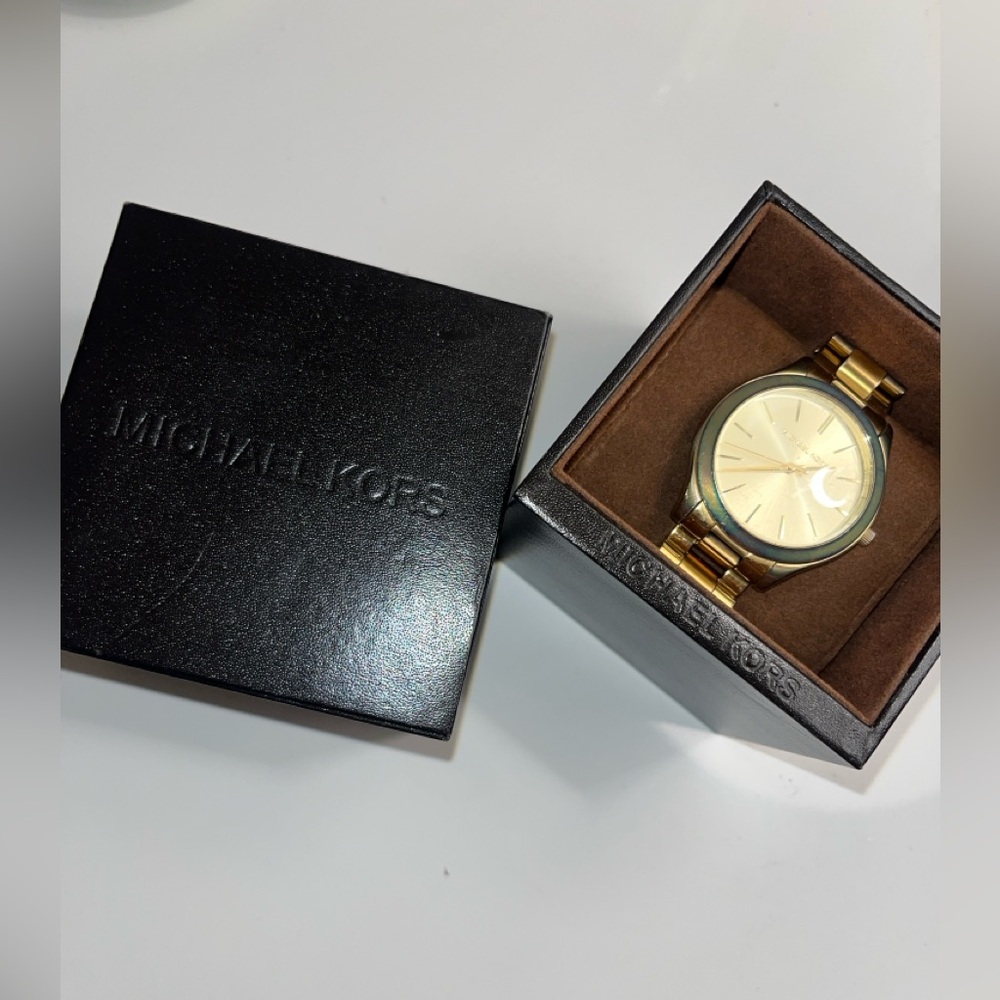 Michael Kors Gold Watch - needs battery replacement. Discolored in some areas